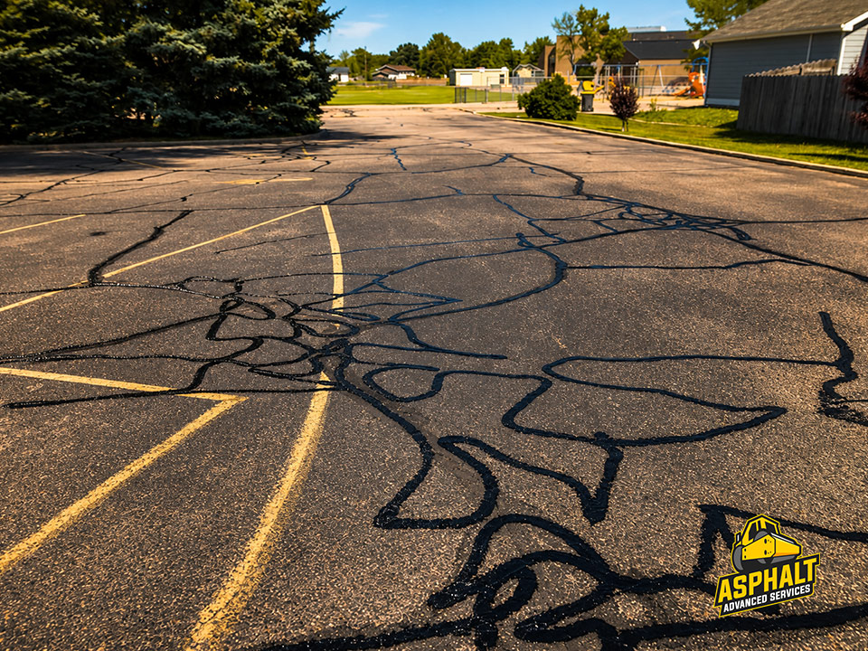 asphalt crack filling colorado springs, asphalt seal coating colorado springs, parking lot repair colorado springs, apshalt advanced services